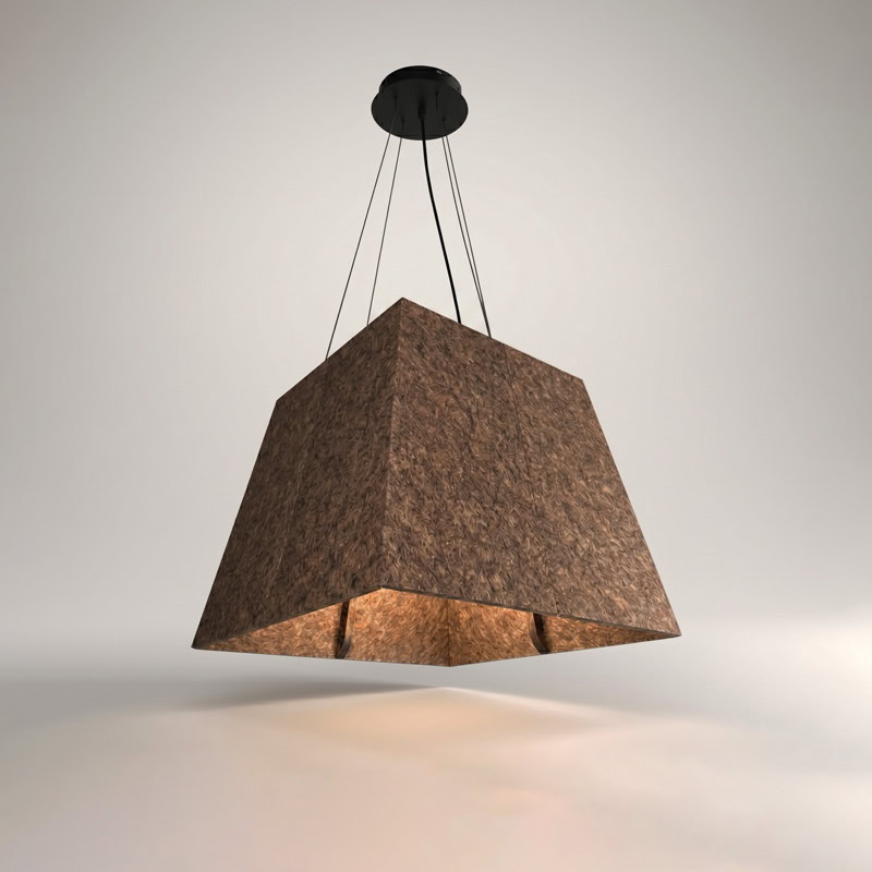 Acoustic pyramid pendant light in felt finish, suspended from black ceiling canopy.