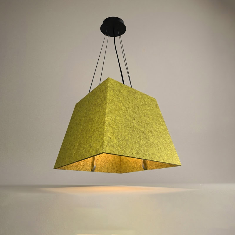 Acoustic pyramid pendant light in felt finish, suspended from black ceiling canopy.