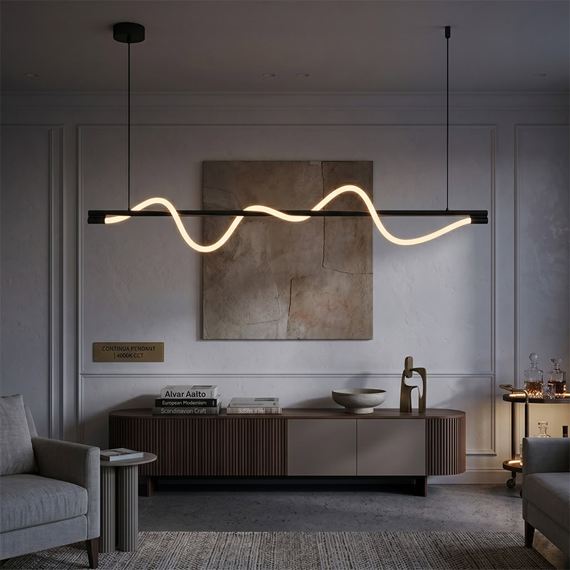 Wavy LED linear rope pendant light hanging over a modern interior space