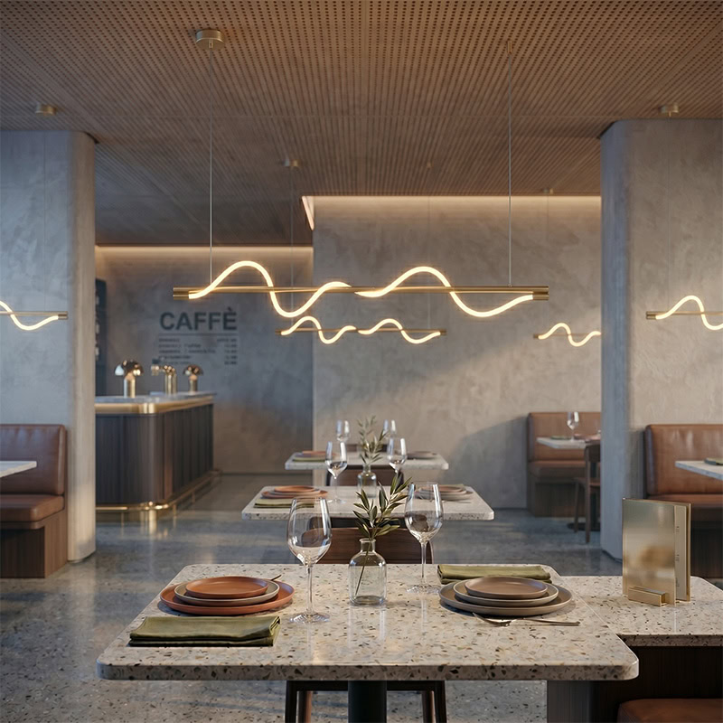 Wavy LED linear rope pendant light hanging over a modern interior space