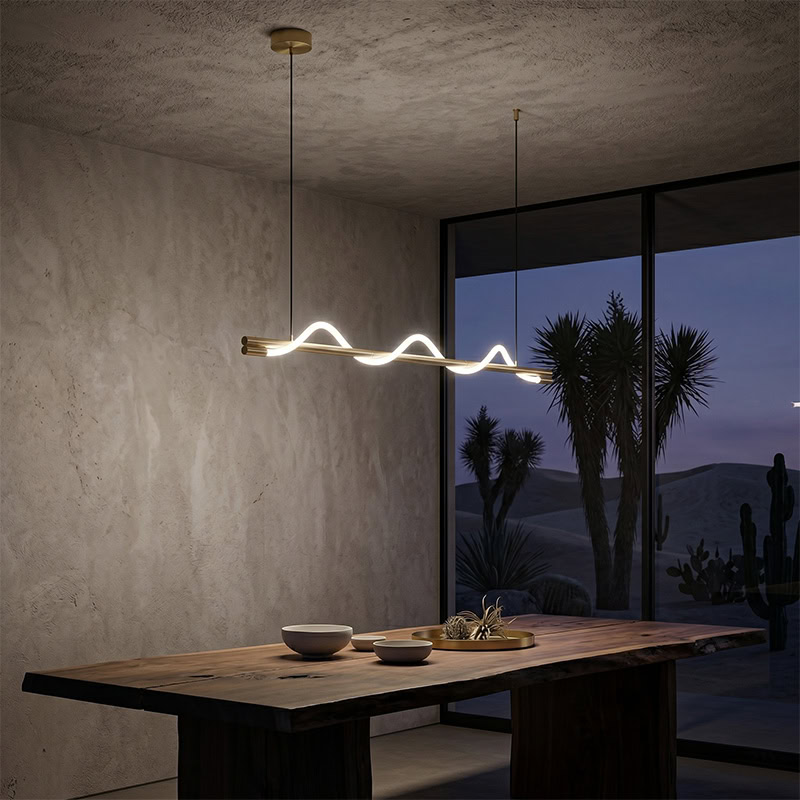 Wavy LED linear rope pendant light hanging over a modern interior space