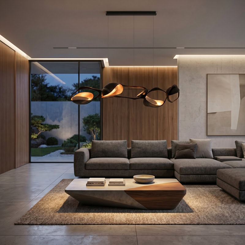Black Designer Sculptural Pendant Light NOVARA LG363 with flowing curvilinear metal rings in a black and gold finish above an interior setting