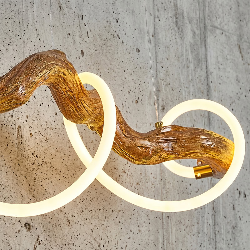 Sculptural resin rope pendant light with integrated LED, organic branch-inspired design, and 360° illumination for modern interiors.