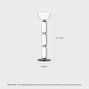 Modern Glass Column Floor Lamp FOSCHO LG356 with stacked clear glass cylinders and matte black frame, casting soft ambient light in a contemporary interior space.
