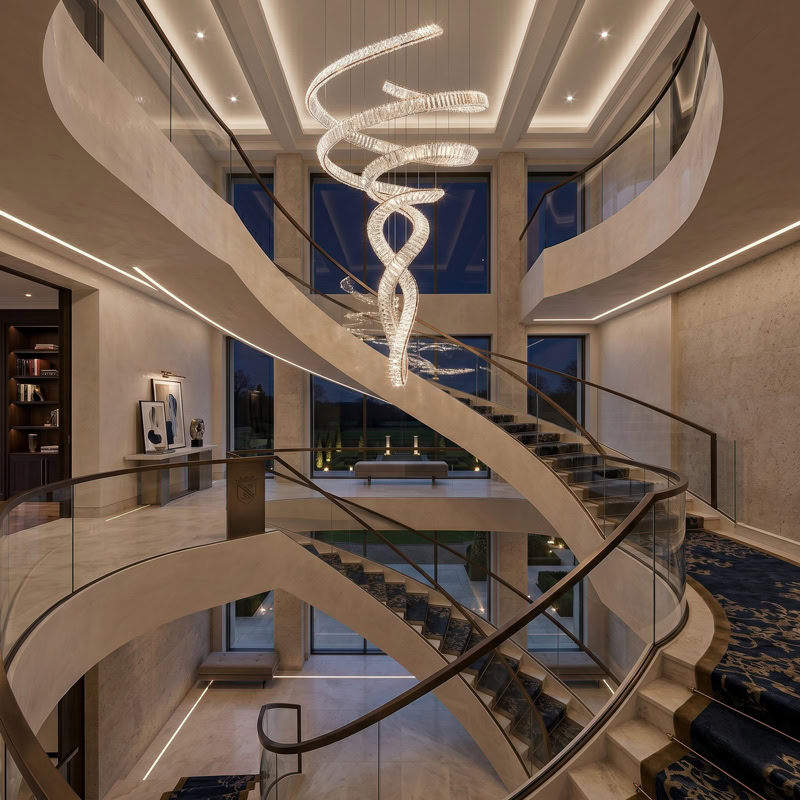 Spiral Crystal Chandelier LUXURIA LG352 with serpentine crystal form and metal frame in a double-height interior