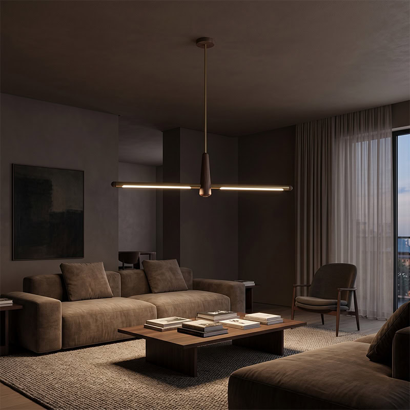 Walnut brass linear pendant light with integrated LED suspended over interior space