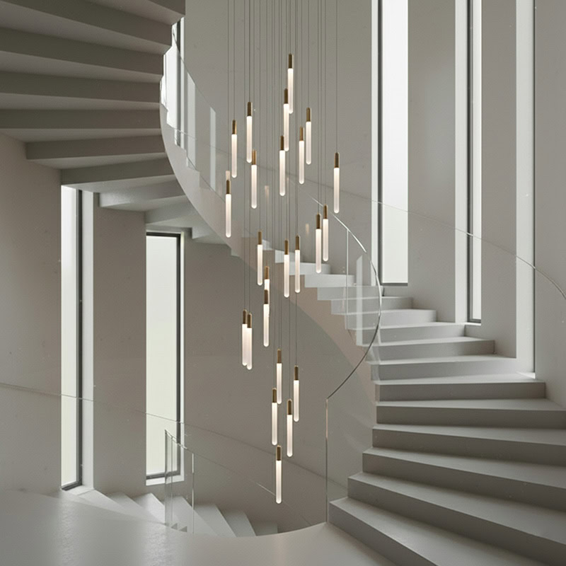 vertical hanging tube chandelier in double height staircase